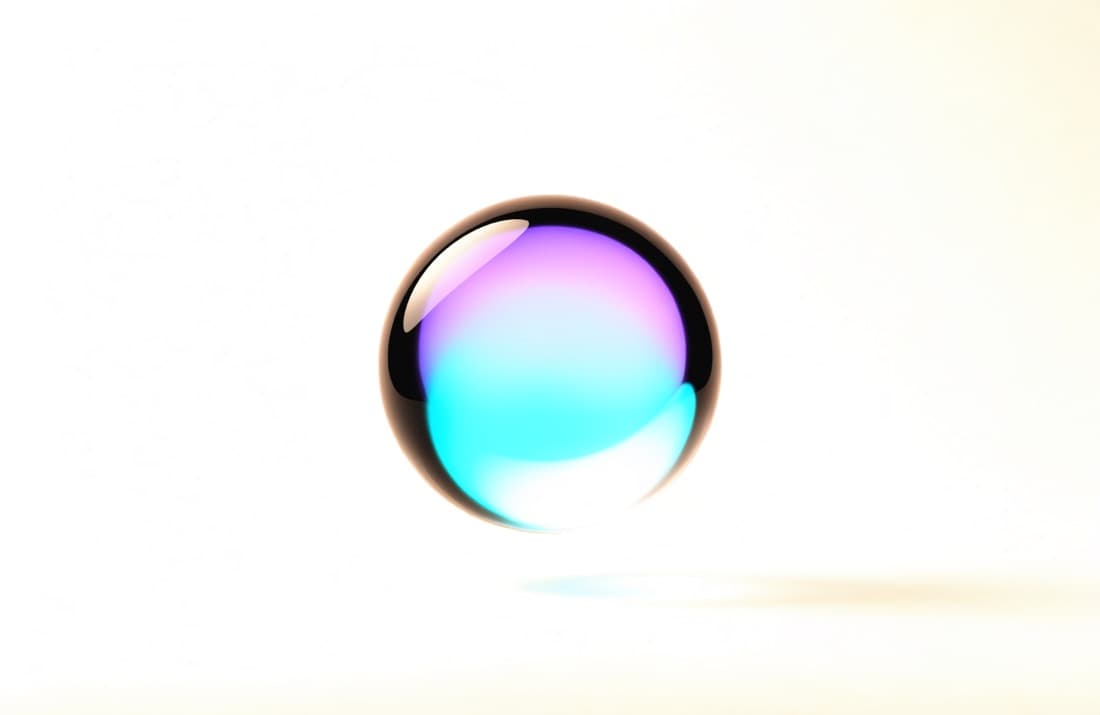 Translucent glass sphere with a glowing cyan-to-violet core — the Signal brand mark in 3D